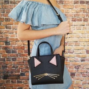 Kate spade mini Hayden jazz things cat.  Reposhing.